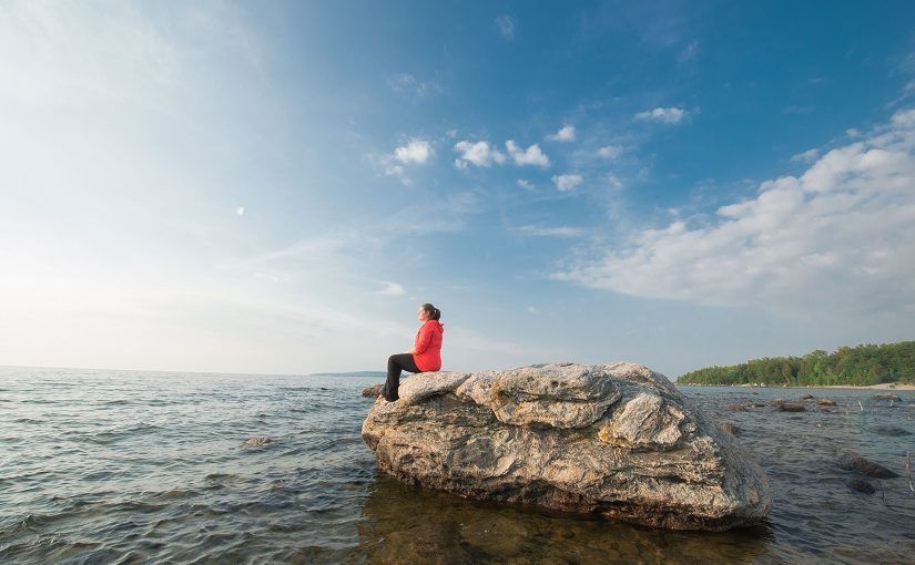 Person on rock at Awenda Provincial Park