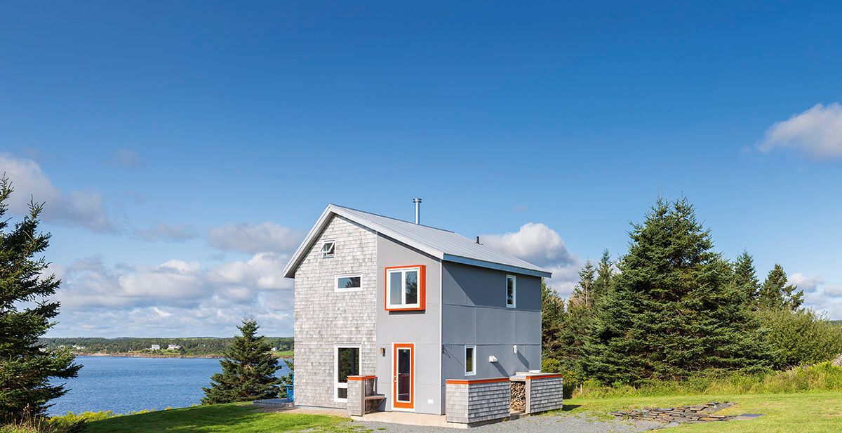 Grey and orange cottage in Nova Scotia