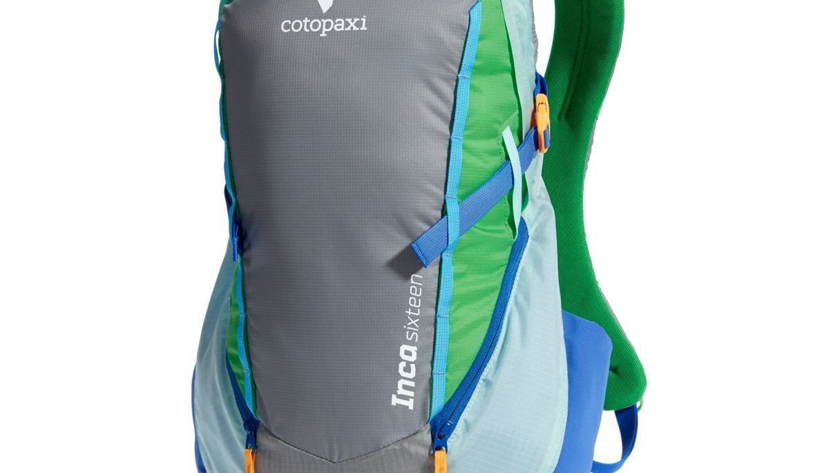 Cotopaxi backpack in grey with blue, green and orange details