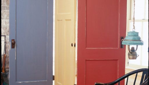 Three doors hinged together to create a privacy divider