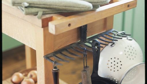 Kitchen supplies hanging from rake head