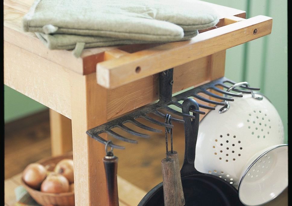 Kitchen supplies hanging from rake head