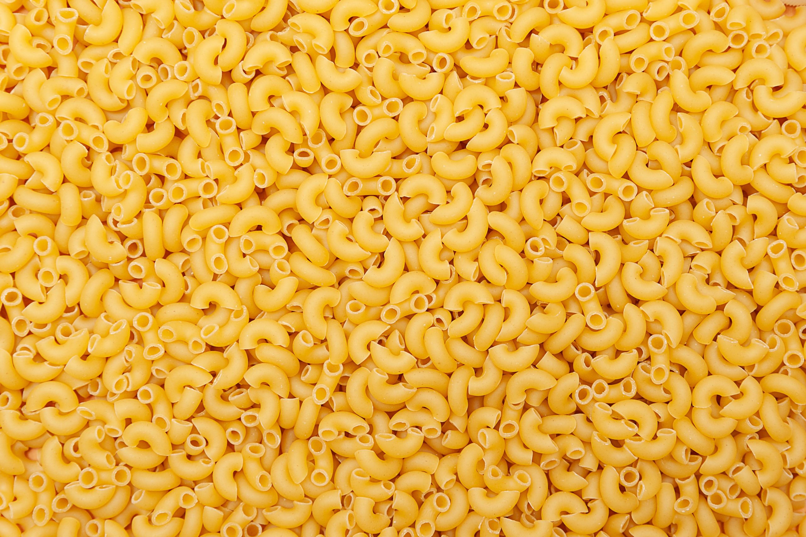 Full screen of uncooked macaroni
