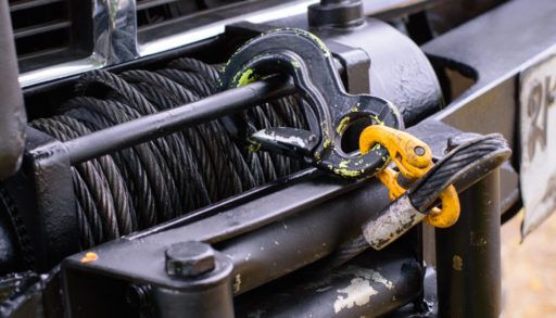 electric winch hooked up to front truck bumper