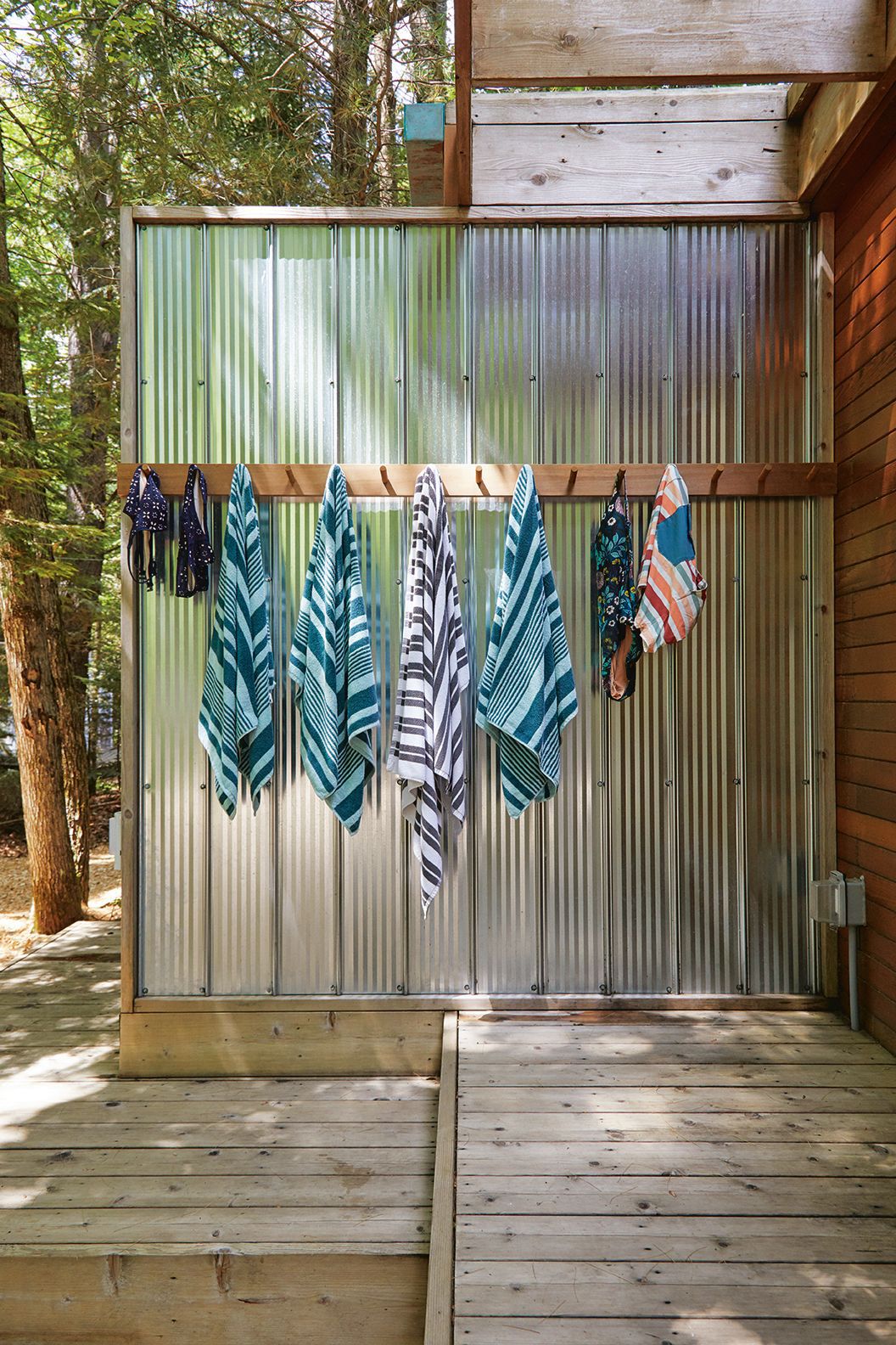 outdoor-shower-towel-rack-shipping-container-cottage
