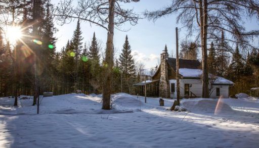 Winter historic log cabin