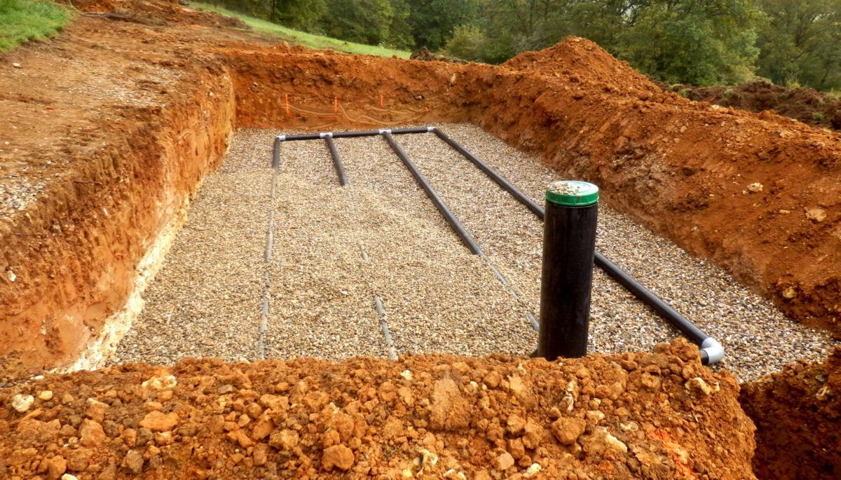 Septic system pipes on a gravel bed
