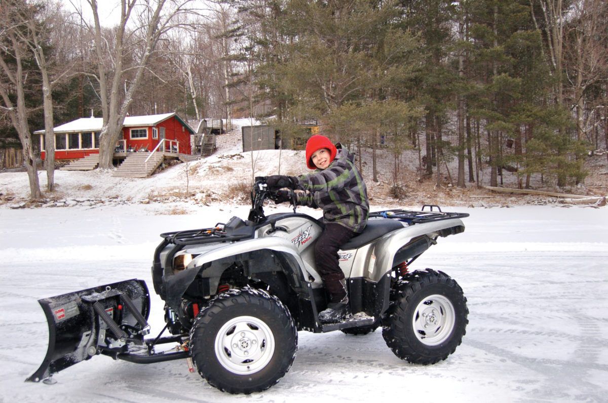 diy snow plow on atv with boy riding atv