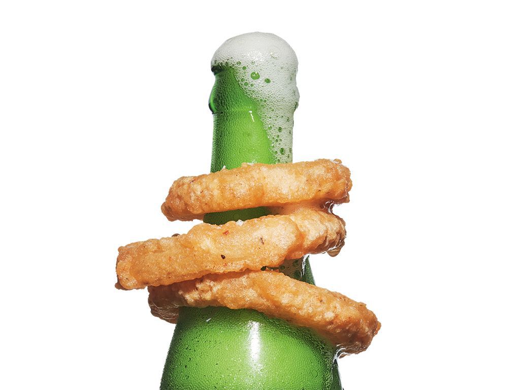 onion rings on the neck of a beer bottle