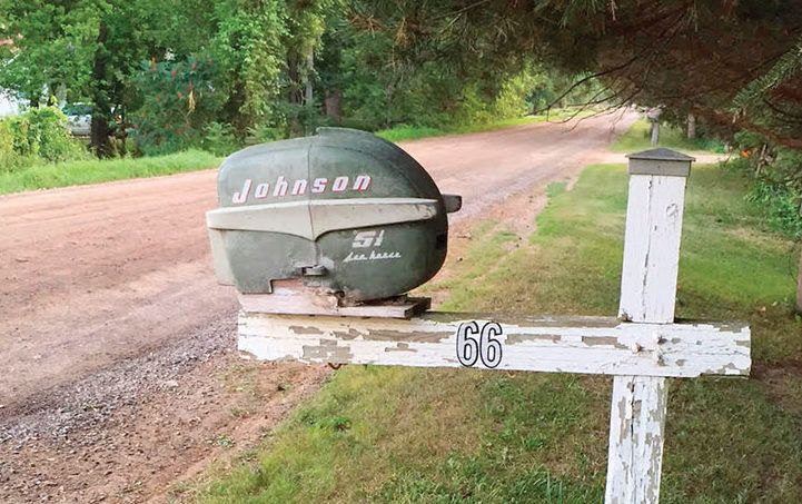Johnson outboard motor turned into a mailbox on the side of the road