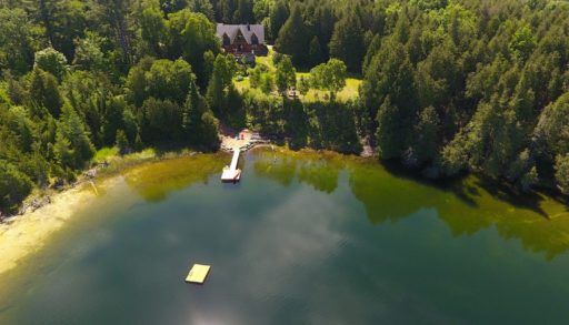 log cabin on lake