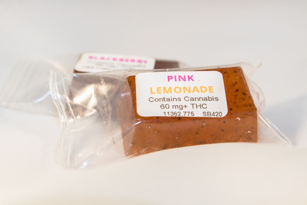 Pink lemonade flavoured hard candy edible made with THC from the marijuana plant for medicinal use