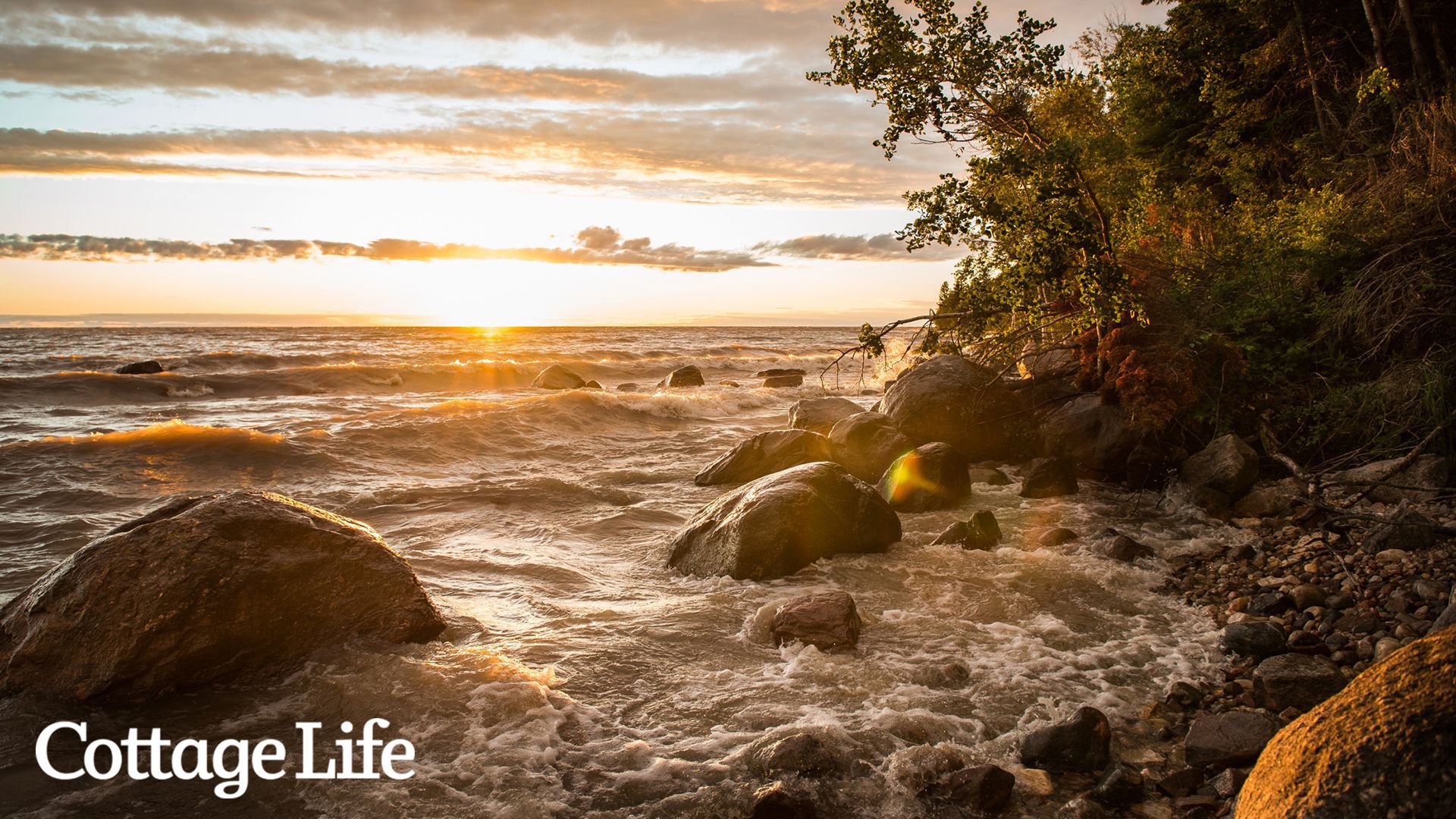 Waves crash onto a rocky shore