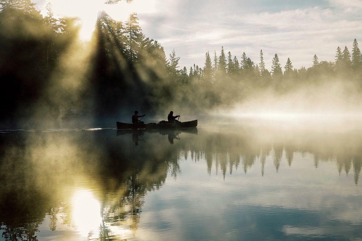 Canoe on Canoe Lake on a misty morning