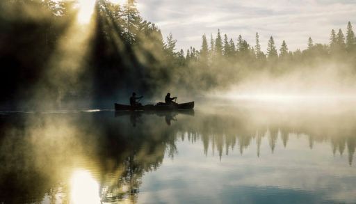 Canoe on Canoe Lake on a misty morning