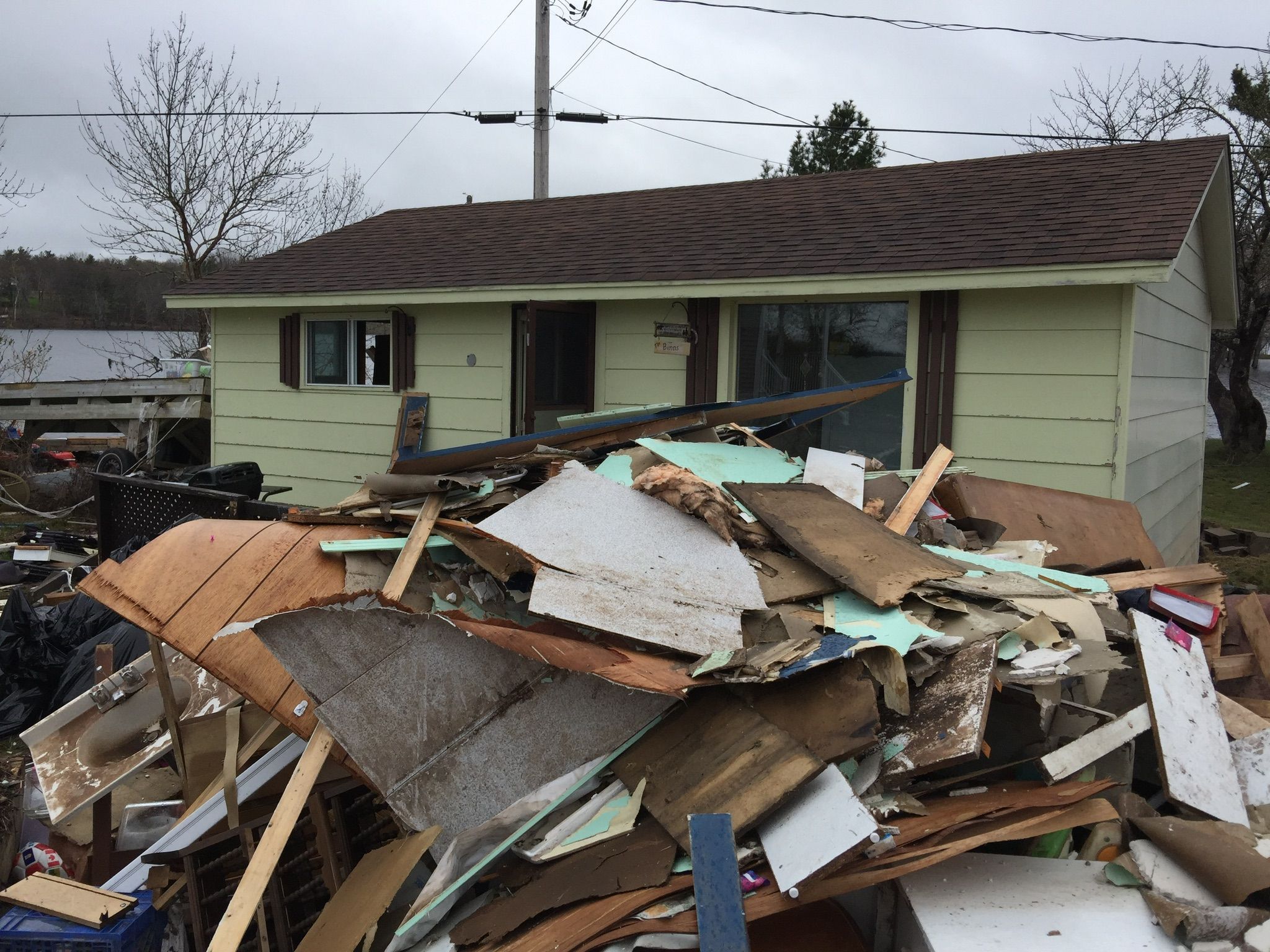 cottage wreckage after flood