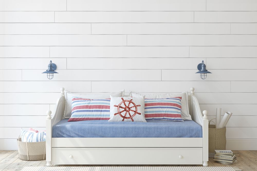 Kids room in coastal style. Daybed near shiplap wall. Interior mockup. 3d render.