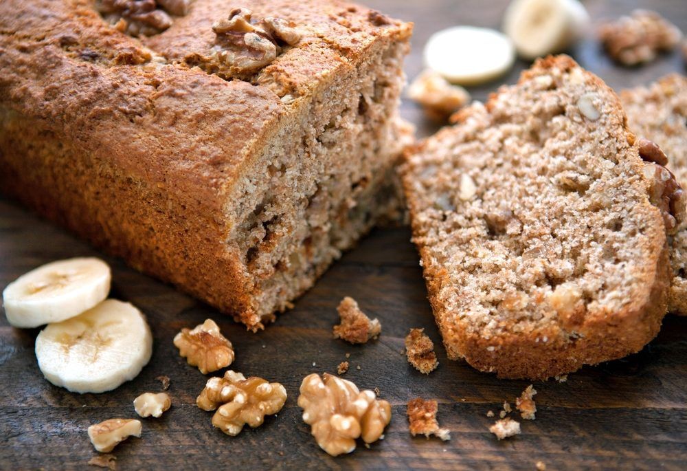 Banana bread loaf on cutting board