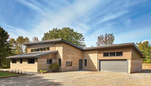 rammed earth house from the outside, sustainable