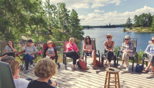 The cottage book club meets on the deck