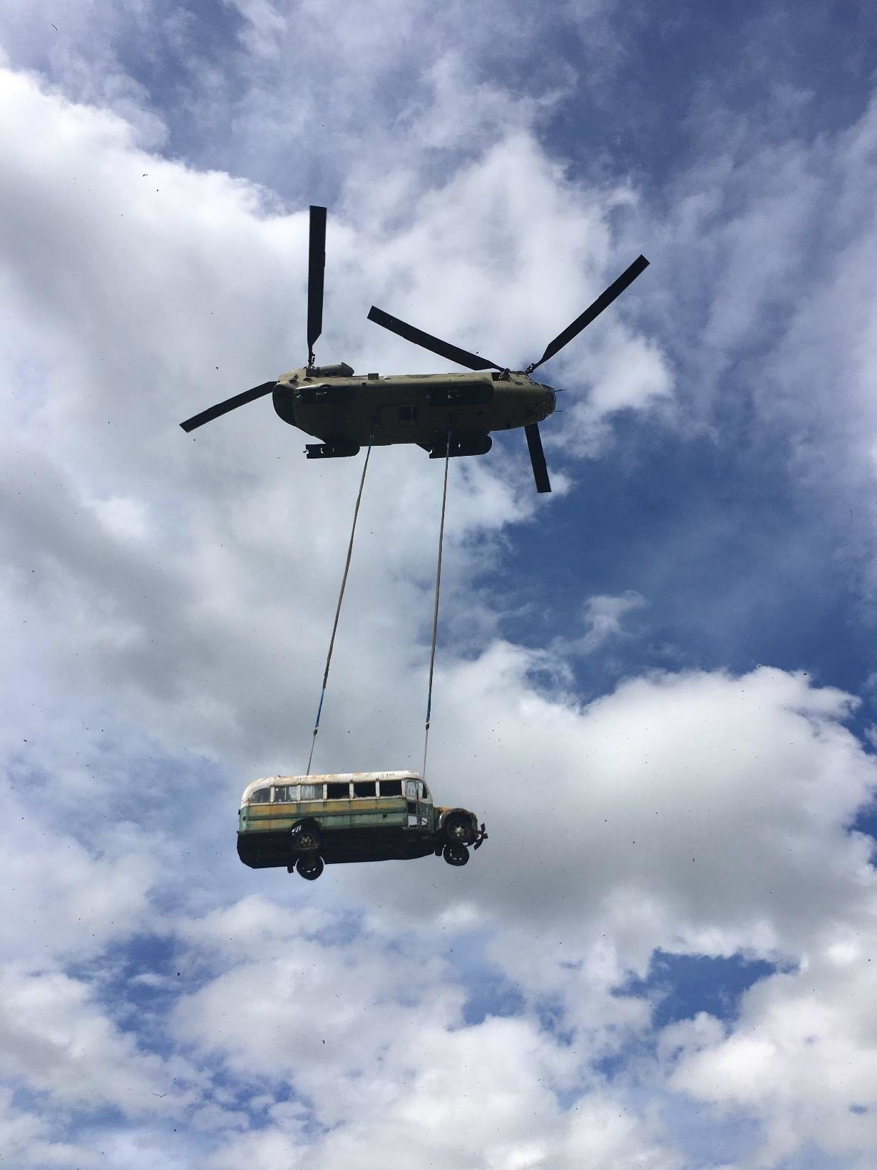 Bus 142 being airlifted by helicopter