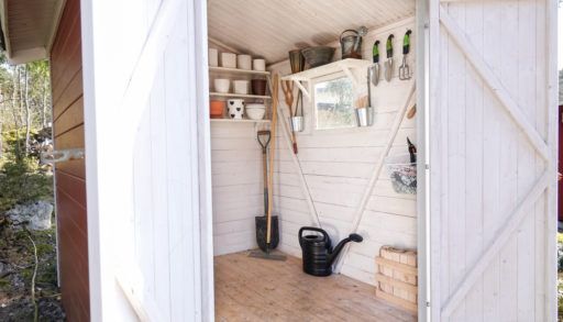 An open shed with tools inside