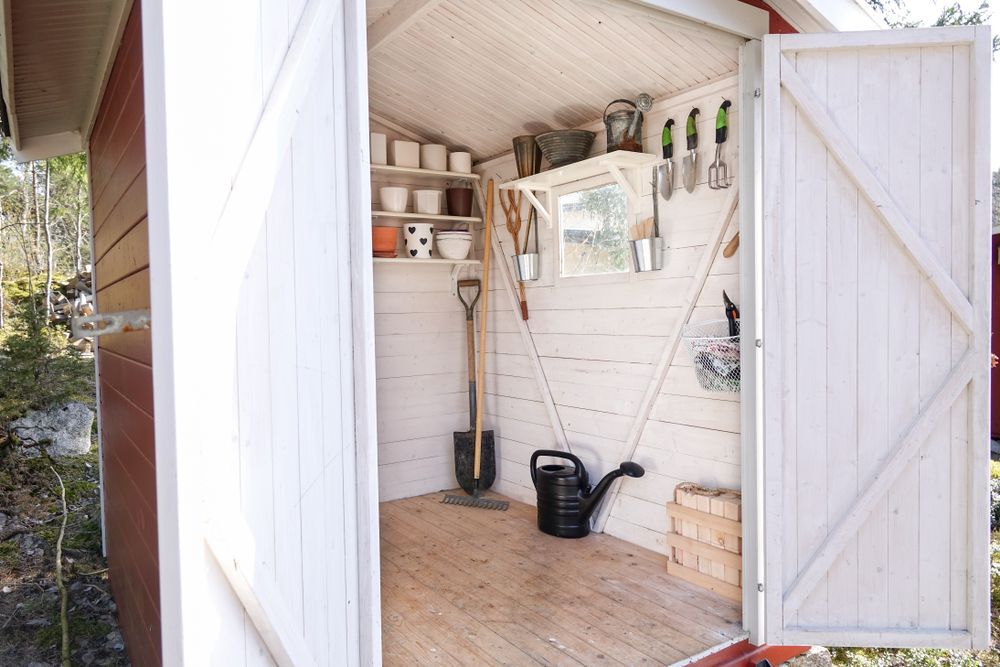An open shed with tools inside