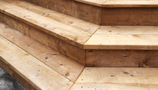 close-up of wraparound stairs on a deck