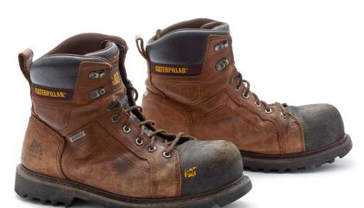 caterpillar work boots shot on white, tool