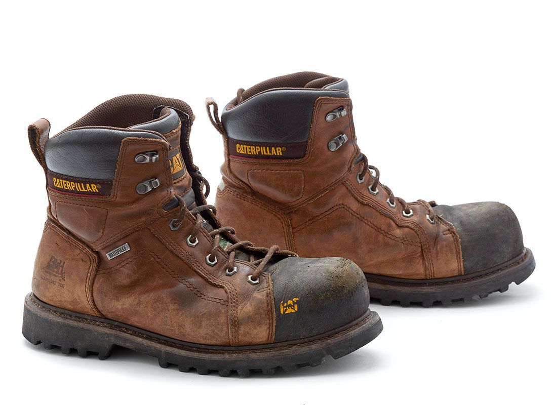 caterpillar work boots shot on white, tool