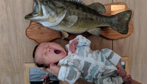 baby and a bass with open mouths