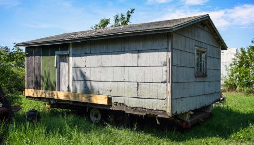 Asbestos shingles on a small cabin