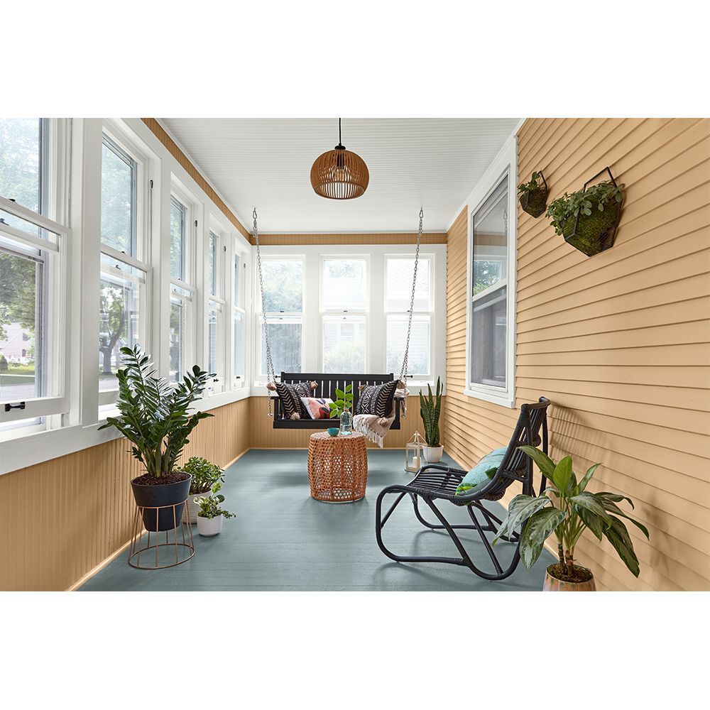 camel paint colour on the walls of an enclosed porch