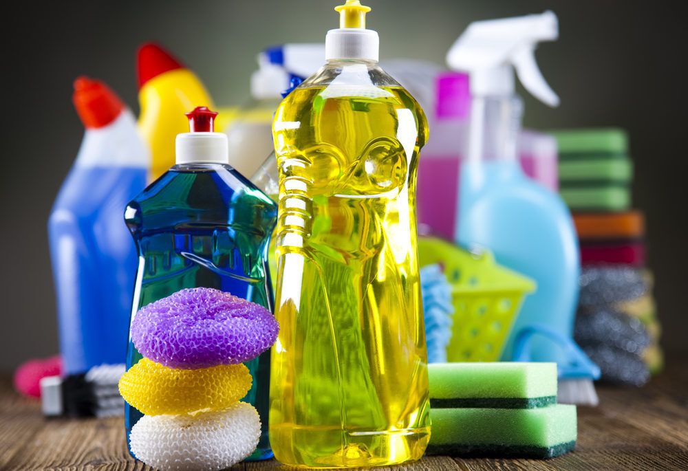A close-up of several colourful cleaning products