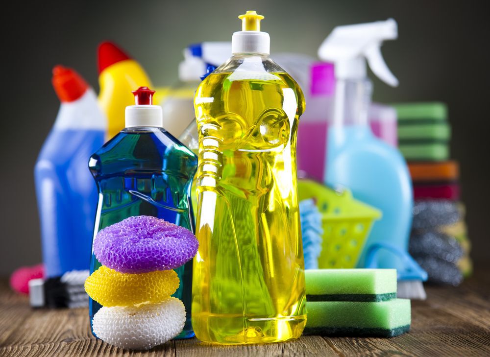 A close-up of several colourful cleaning products