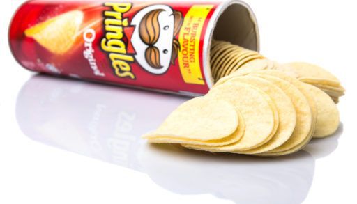 Tube of original pringles on white background, secret spot