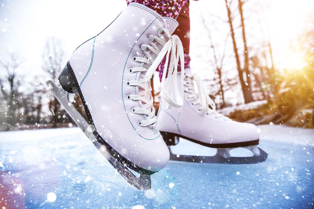 A close-up of a pair of woman's skates