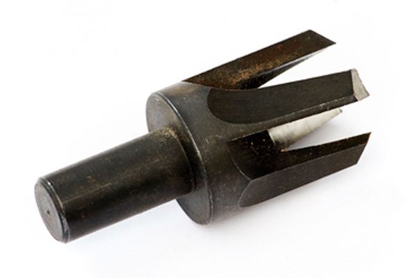 tapered plug cutter drill bit on a white background