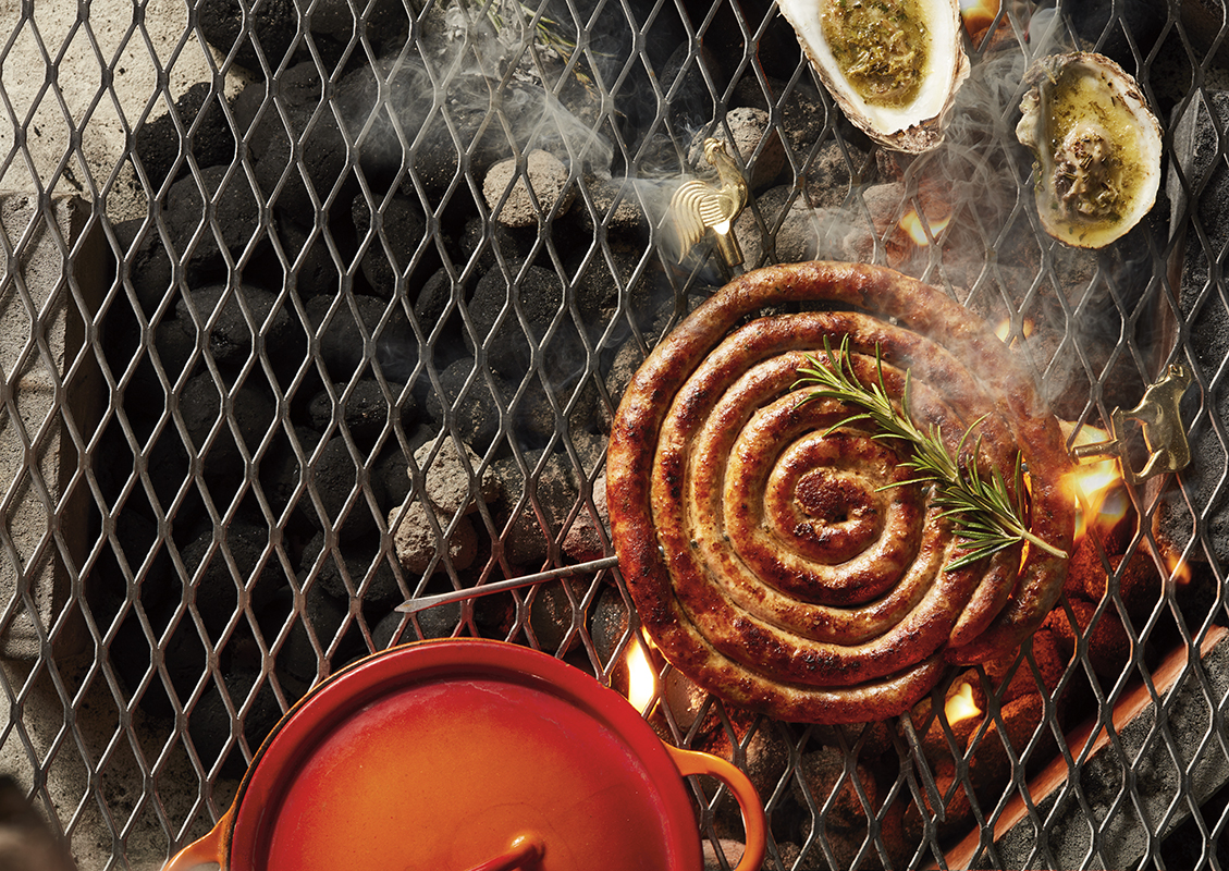 a sausage coil on a grill