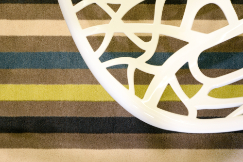 Closeup on table over colorful rug
