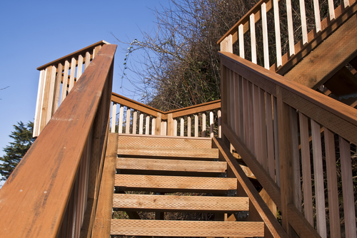 new wooden deck and stairs on the downhill