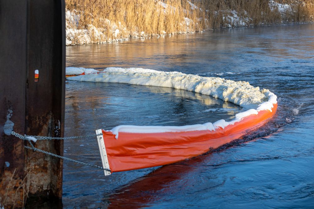 foam-in-Ontario-lake-water-stopped-by-floating-boom-to-prevent-pollution