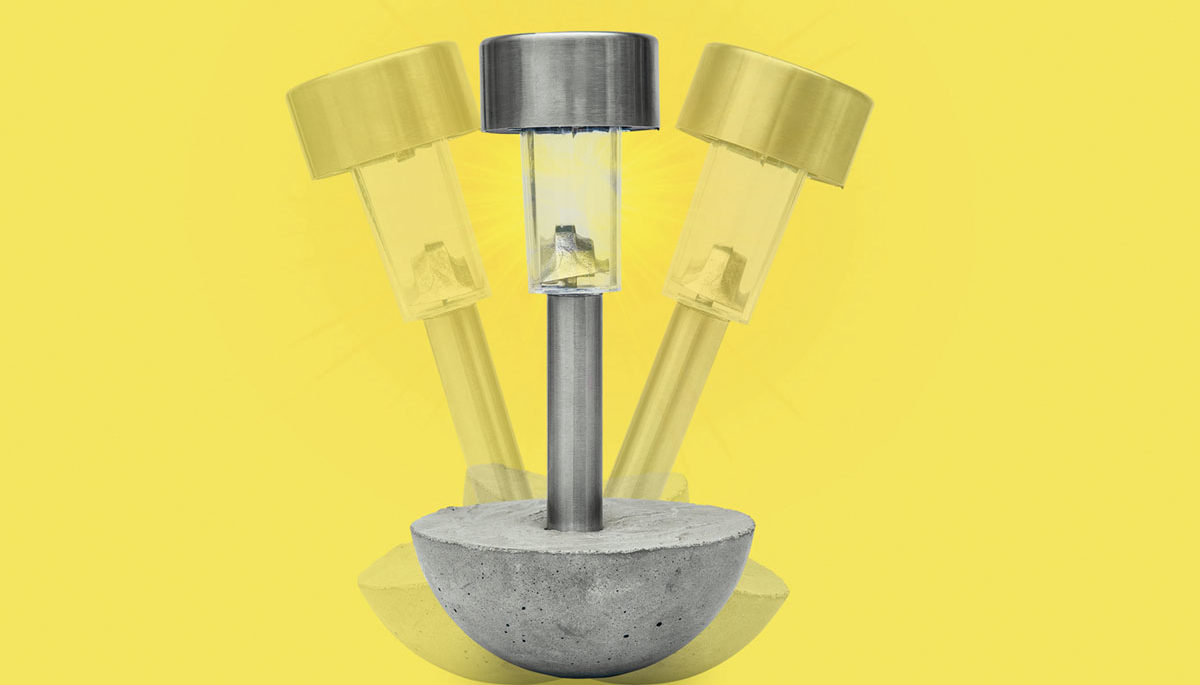 A solar stake light in a spherical cement mould.