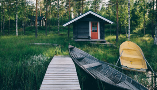 boat in front of cottage