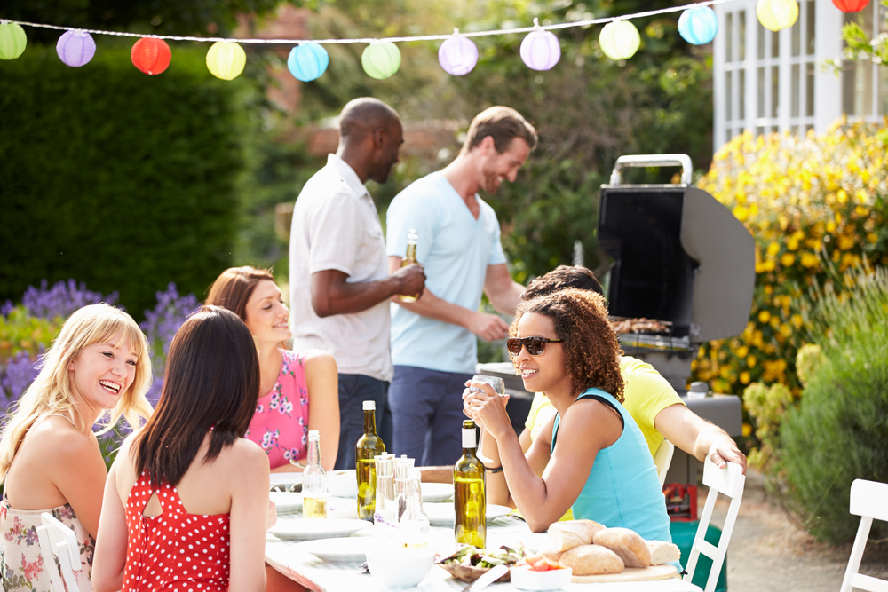 A group of people at a barbecue.