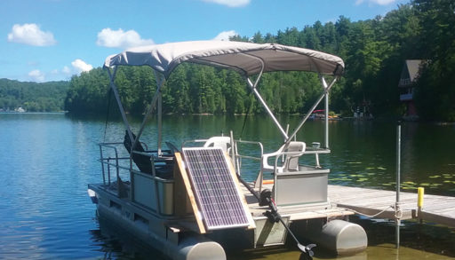 A pontoon with solar panels.