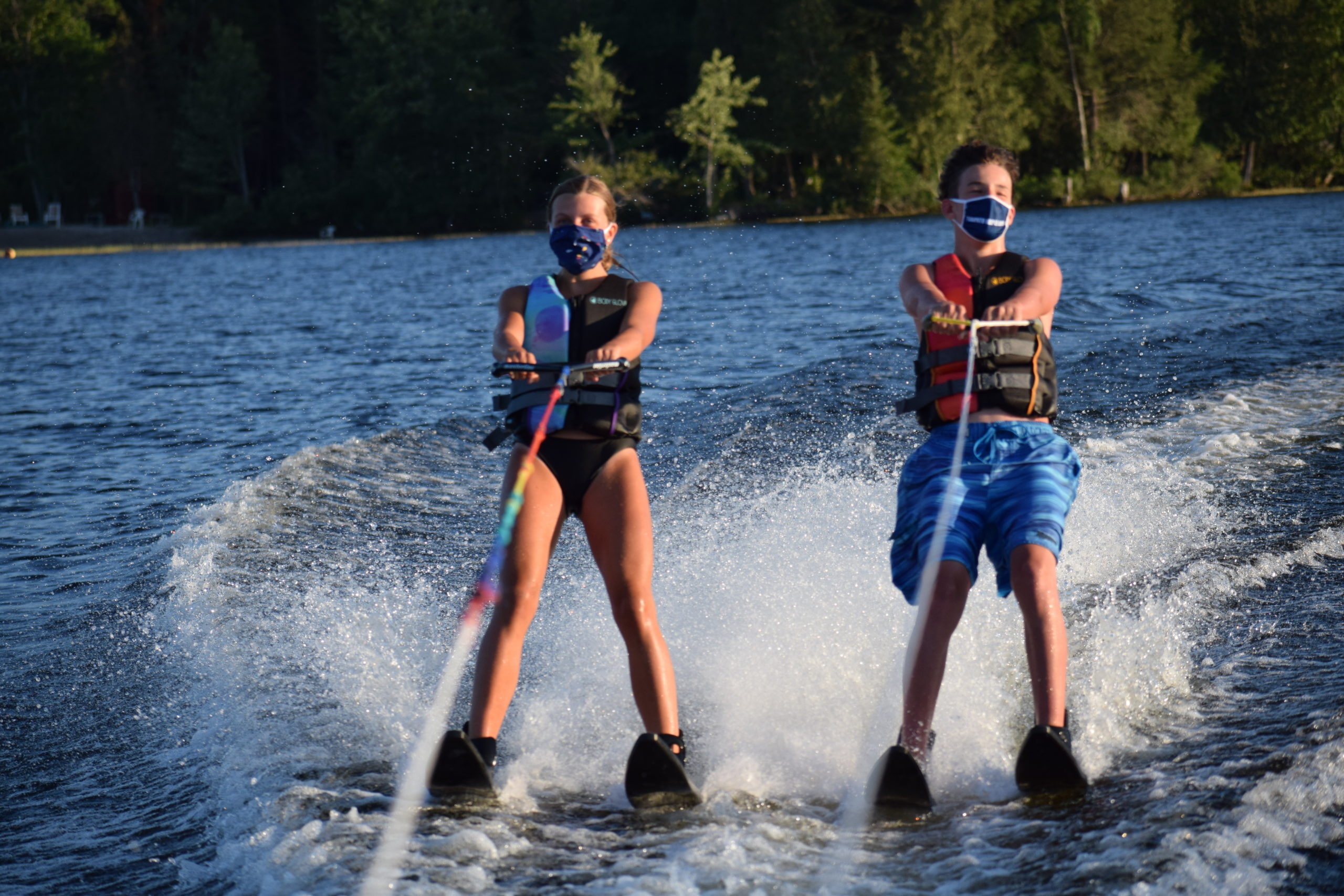 Waterskiing with masks on