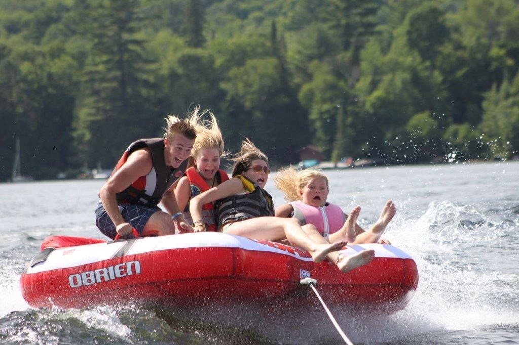 Family going tubing on water
