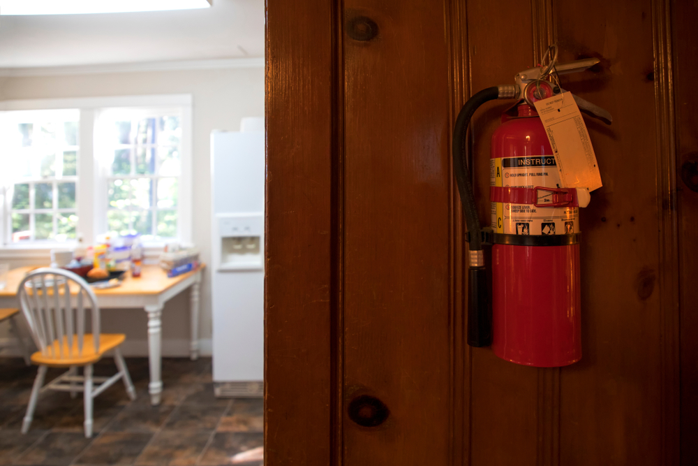 wall mounted fire extinguisher near the kitchen