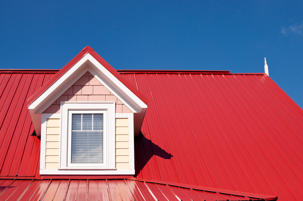 red metal roof with dormer window